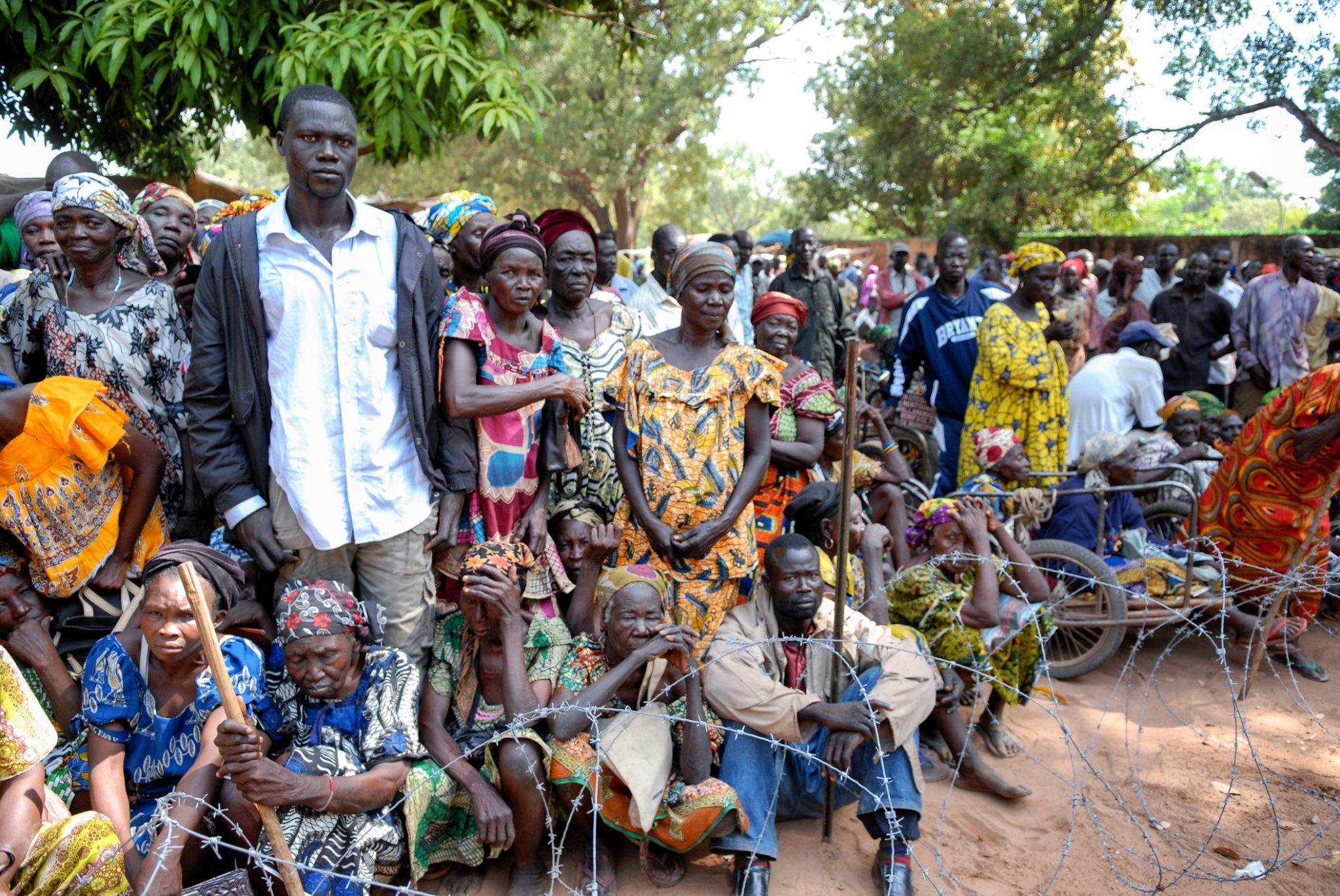 Farchana, Chad - October 30, 2012: In the photo we can see an African refugees who are ready to leave them country for having better life. They are wearing traditional clothes and waiting from early in the morning for the transportation.